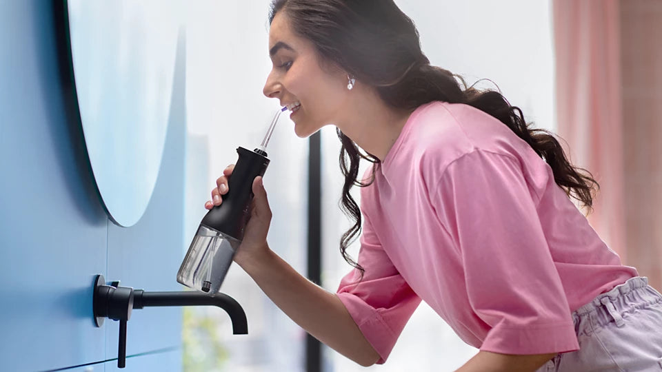 Philips Sonicare Cordless Power Flosser DiamondClean 9000 mutes dobuma irrigators, melns HX3886/43
