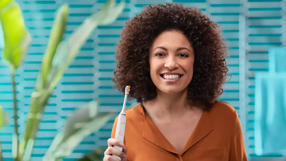 PHILIPS Sonicare zobu birste DiamondClean ar īpašu  lietotni, balts/rozā zelts HX9914/69