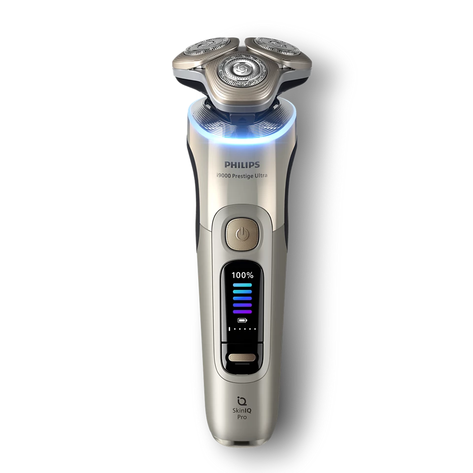 PHILIPS i9000 Prestige Ultra Elektroskuveklis mitrai/sausai skūšanai (lādējams), baltais zelts XP9403/31