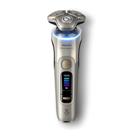 PHILIPS i9000 Prestige Ultra Elektroskuveklis mitrai/sausai skūšanai (lādējams), baltais zelts XP9403/31