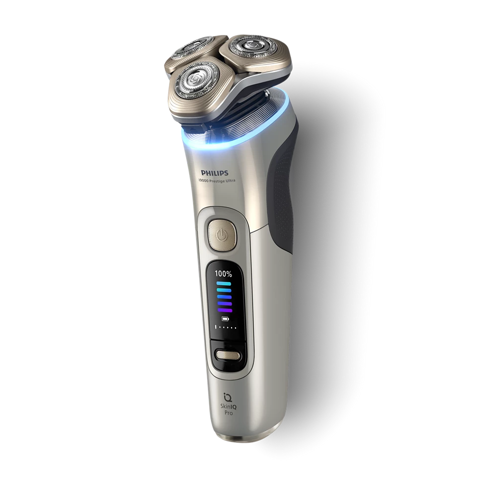 PHILIPS i9000 Prestige Ultra Elektroskuveklis mitrai/sausai skūšanai (lādējams), baltais zelts XP9403/31