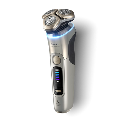 PHILIPS i9000 Prestige Ultra Elektroskuveklis mitrai/sausai skūšanai (lādējams), baltais zelts XP9403/31