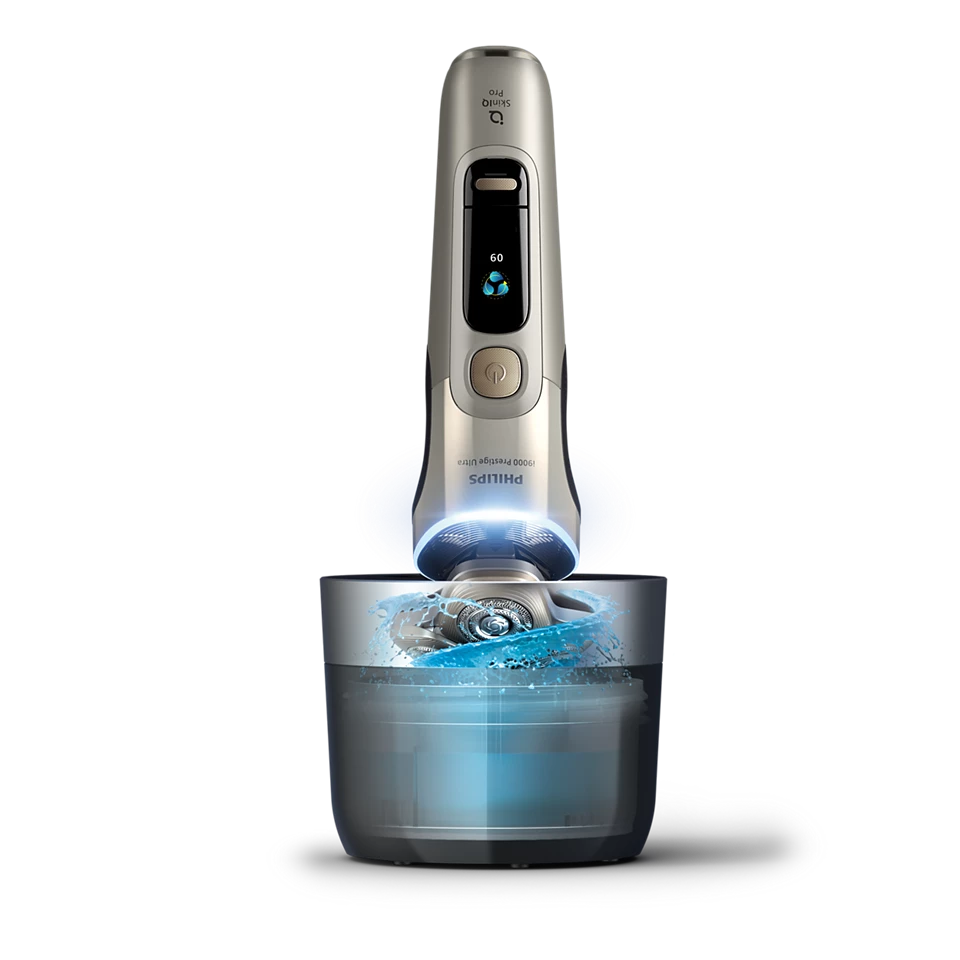 PHILIPS i9000 Prestige Ultra Elektroskuveklis mitrai/sausai skūšanai (lādējams), baltais zelts XP9403/31